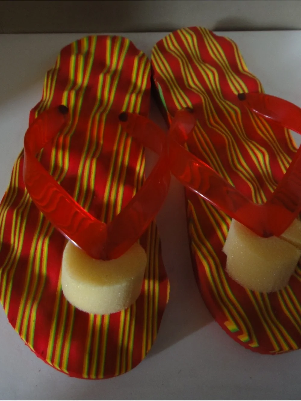 Women's Red Striped Flip Flop Sandals with Translucent Red Straps